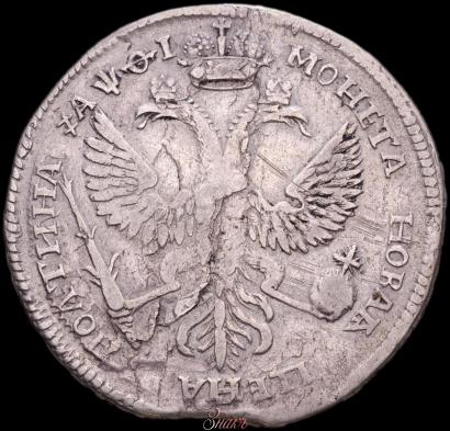 Фото Полтина 1719 года L "Портрет в латах"